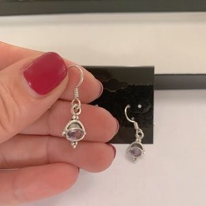 Silver and light purple crystal earrings set.